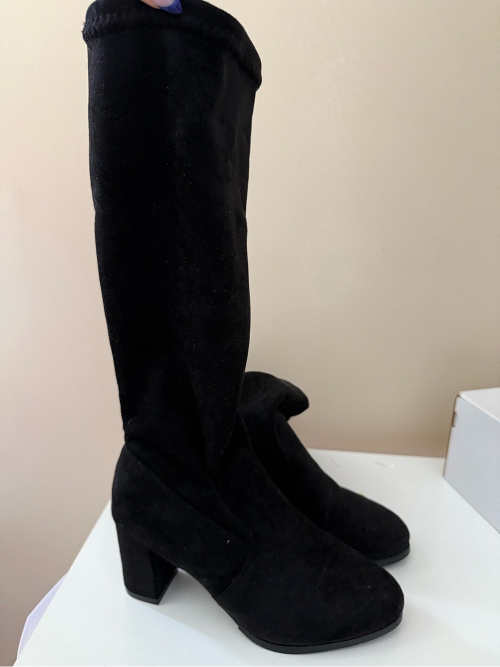 Long black boots
